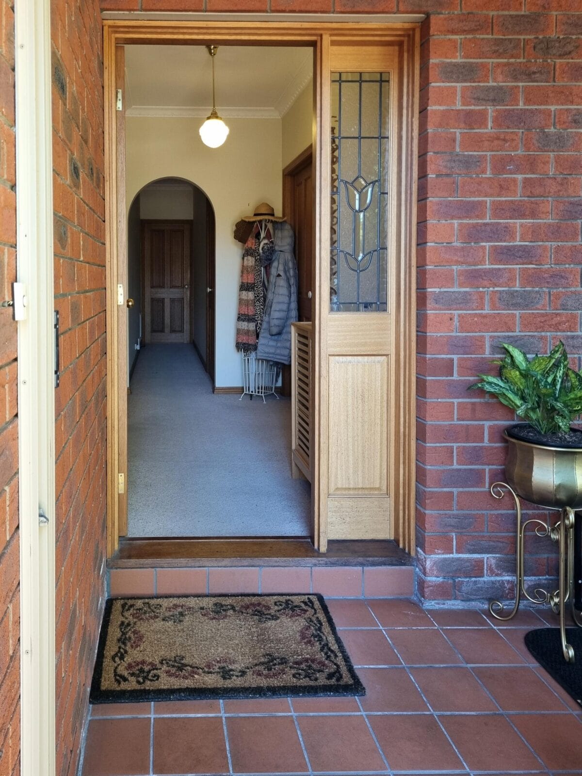 Open doorway leading into Body Nurture Massage home clinic in Ballarat, showing welcoming entry and calm interior space.