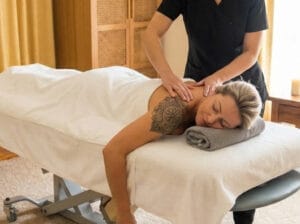 Woman receiving gentle neck and shoulder relaxation massage at Body Nurture Massage Ballarat.